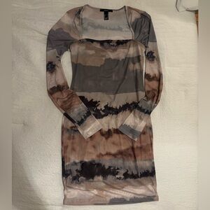 Brand new sheer, double lined mini dress